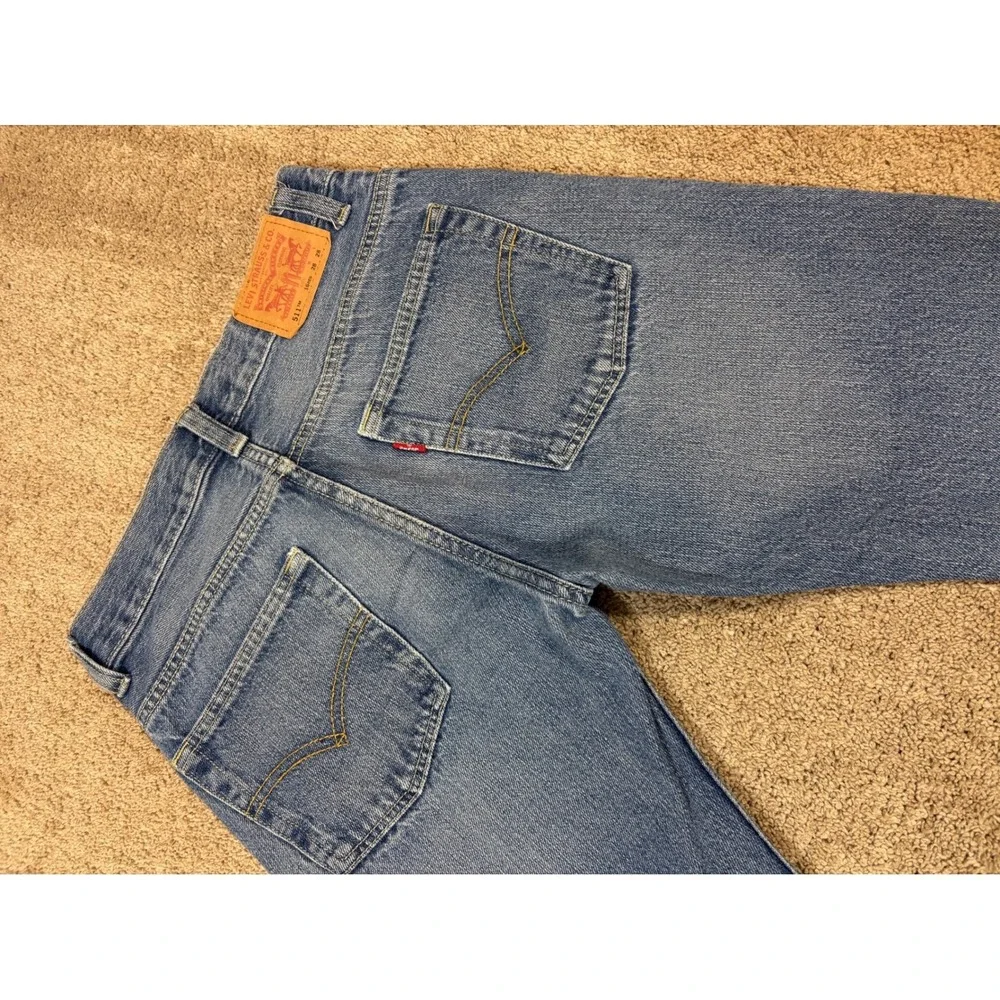 Levi's 511 Slim Fit Mens Jeans Medium Wash Distressed Pockets W28 L28‎